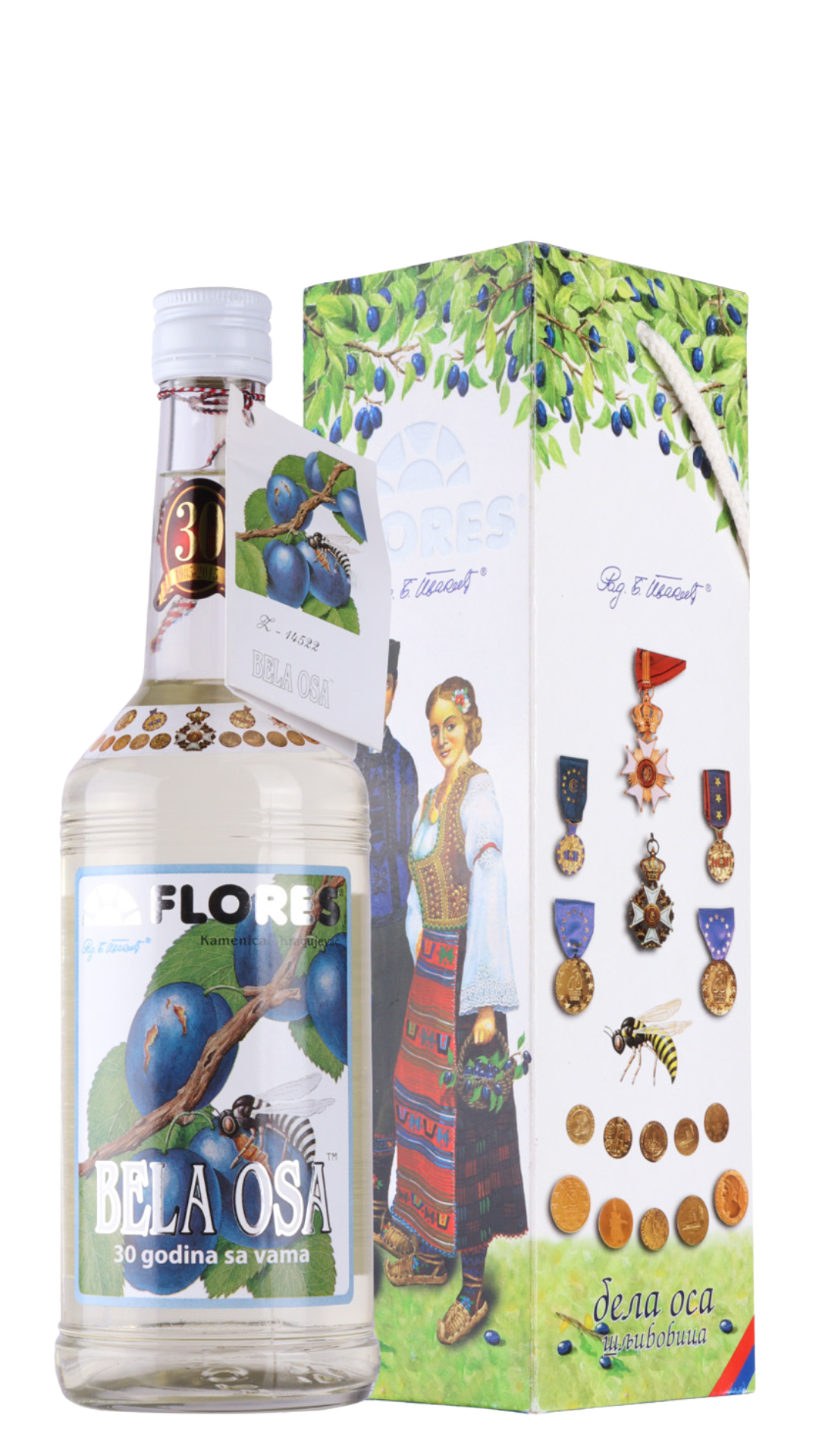 A bottle of Flores Bela Osa brandy with a decorative label, accompanied by a gift box featuring traditional Serbian designs and a bird illustration.