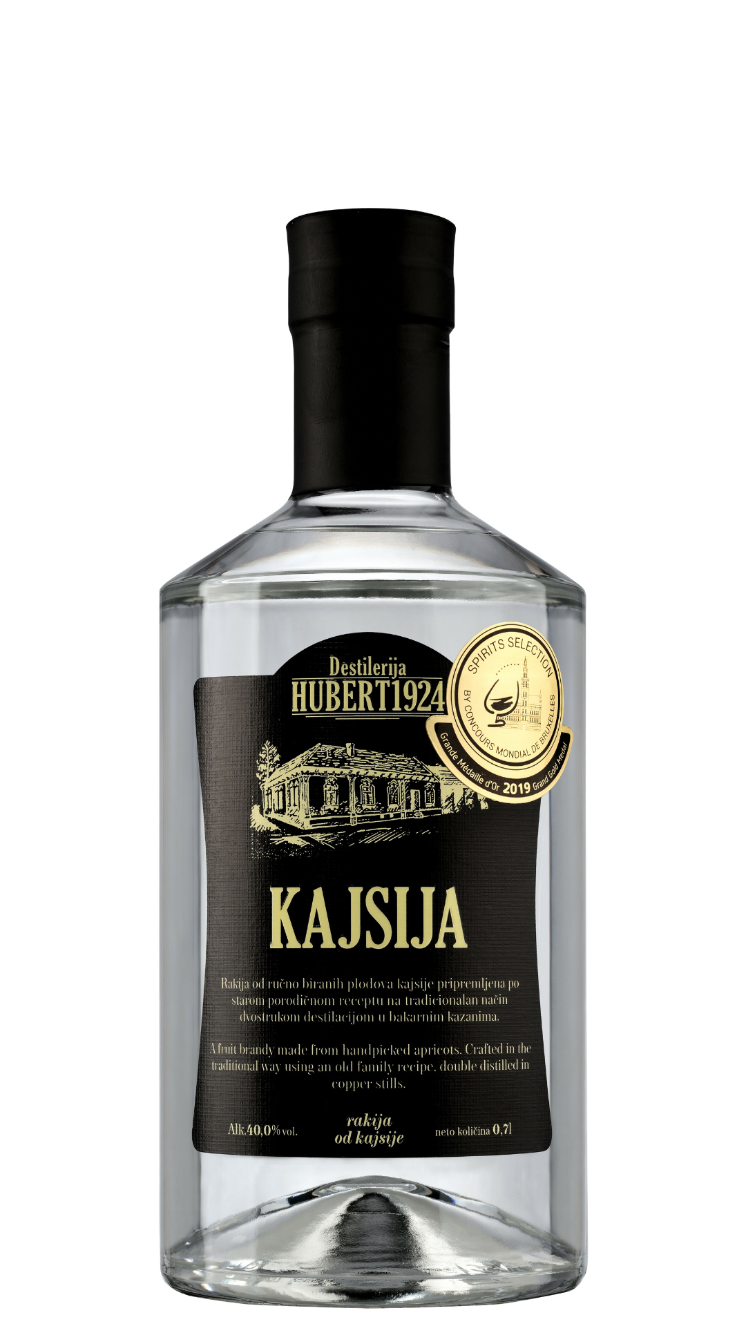 A bottle of Hubert Apricot Brandy with a label that includes the brand name and the word 'KAJSIJA' in bold letters, indicating a specific variety or product line. The bottle is clear, showcasing the brandy inside, and has a black cap.