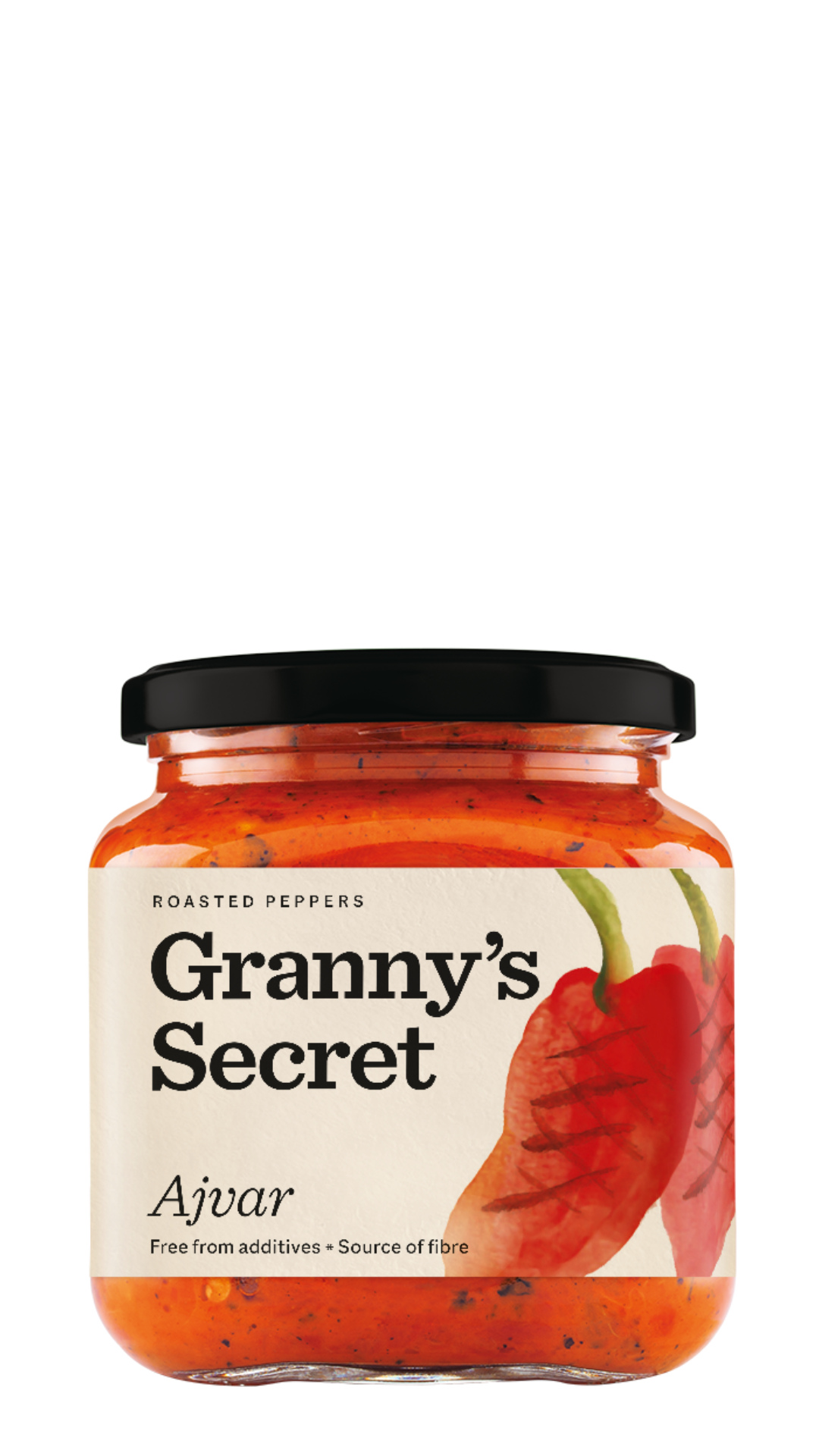 A jar of Granny's Secret Ajvar with a label showing roasted red peppers and the product name.